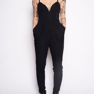 Plunging neck line black jumpsuit